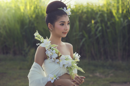 Asian, Portrait women beautiful in white dress.の写真素材