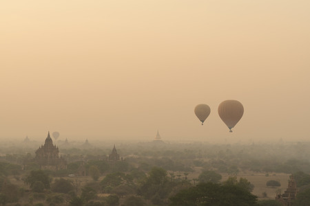 Asian, Hot air balloon of Bagan in misty morning, Myanmar.の写真素材