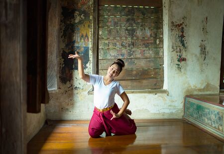 Woman Practicing Traditional Performing Arts of Thailandの写真素材