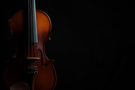 Violin in black isolated background copy space compositionの写真素材
