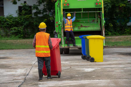 Garbage collectors work together as a team.