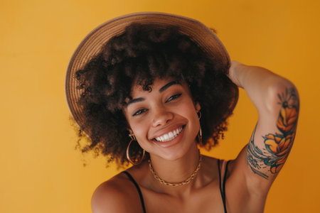 Afro young woman content creator cheerful with working in the studioの素材