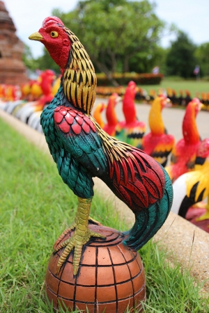 Chicken model, decorated in a gardenの写真素材
