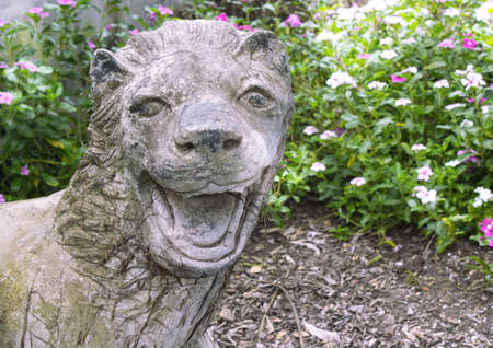 lion statue in park の写真素材