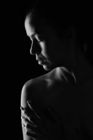 beautiful topless asia woman on black background monochromeの写真素材