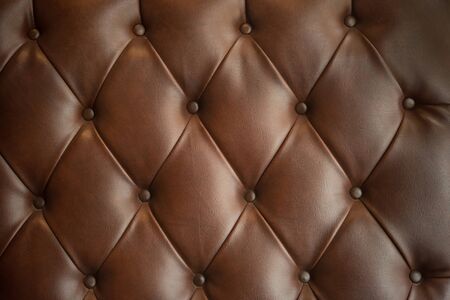 luxurious brown Leather sofa texture backgroundの写真素材