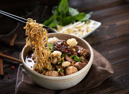 Noodles with pork and pork balls, chilli paste with soup Thai style and vegetable. Boat Noodles....