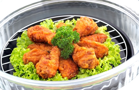 Golden brown fried chicken drumsticksの写真素材