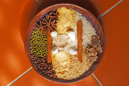 Spices in wooden plateの写真素材
