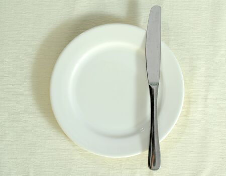 Knife, white plate