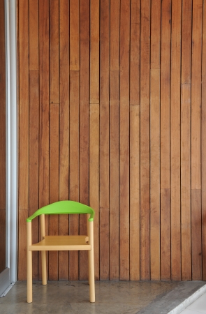 Wooden wall with wood chairの写真素材