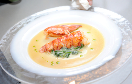 A bowl of creamy delicious lobsterの写真素材