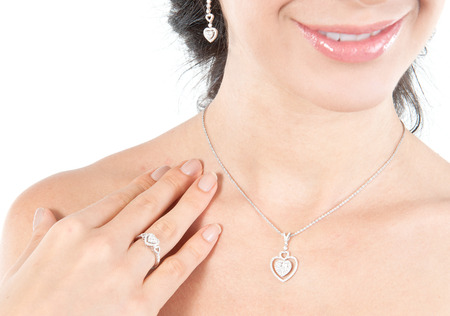 woman wearing diamond necklace and ringの写真素材