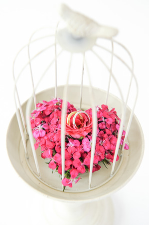 Beautiful wedding still life with bouquet and ringsの写真素材