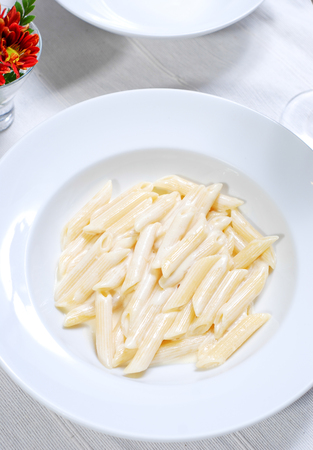 Italian pasta with cream sauceの写真素材