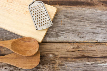 Kitchen tools on wooden background. Top view.の写真素材