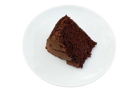 Chocolate cake on white plate. Top view.の写真素材