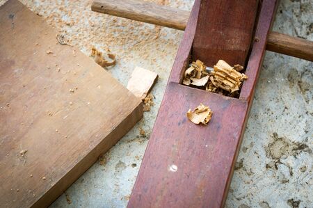 A plane in a carpentry workshop. Tools as a carpenter.