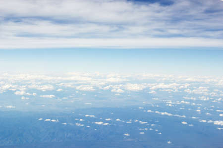 Blue sky and cloud. Window airplane view.