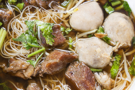 Closeup meat noodle. Thai Noodle small line with beef and meat ball. Favorite meal for lunch. Thailand food.の写真素材