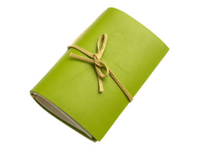 Green leather notebook on white isolate backgroundの写真素材