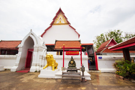 SUPHANBURI, THAILAND - OCTOBER 1, 2018: Black Rahu with golden lion in front of gate at Wat Pa Lelai temple. Favorite landmark of Suphanburi province in Thailand.のeditorial素材