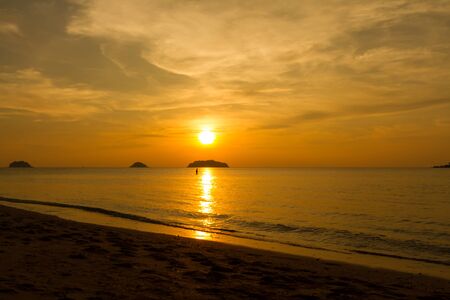 Sunset on the beach at koh chang island, Thailandの写真素材