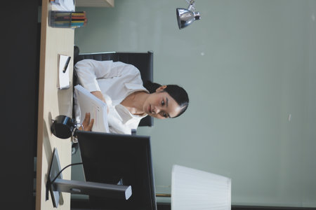 Modern Office Businessman Working on Computer. Portrait of Successful Latin IT Software Engineer...