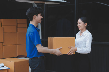Truck Mover Unloading Van Carrying Boxes And Moving Houseの写真素材