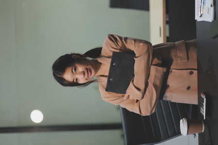 Asian woman working at office, Tired asian businesswoman with headache at office, feeling sick at...