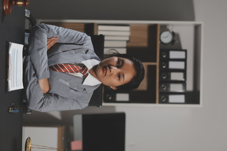 Law theme, mallet of the judge, law enforcement officers, evidence-based cases and documents taken into account.の写真素材