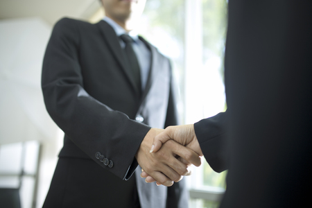 Business handshake and business peopleの写真素材