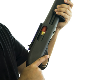 man is holding a shotgun, isolated on white