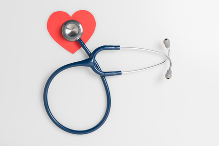 Top view blue stethoscope on white background. For check heart or health check up conceptの写真素材