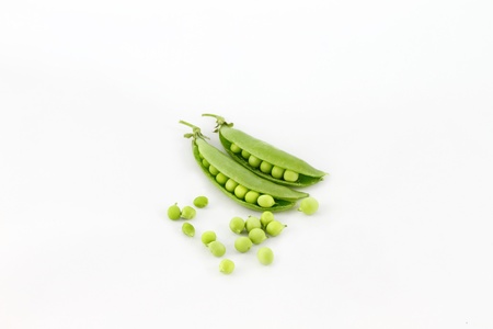 Two Sugar snap pea  pods isolated on white background   