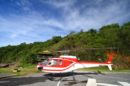 Red Helicopter at a heliport