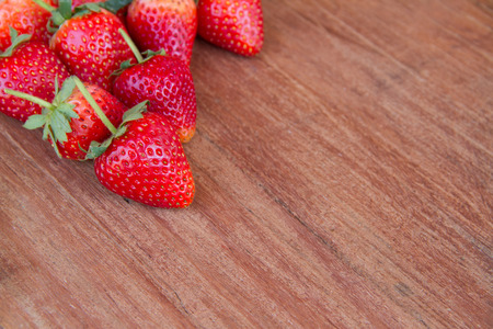 strawberry  on a wood  backgroundの写真素材