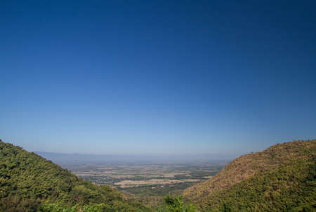 Two mountains with a sky backgroundの写真素材