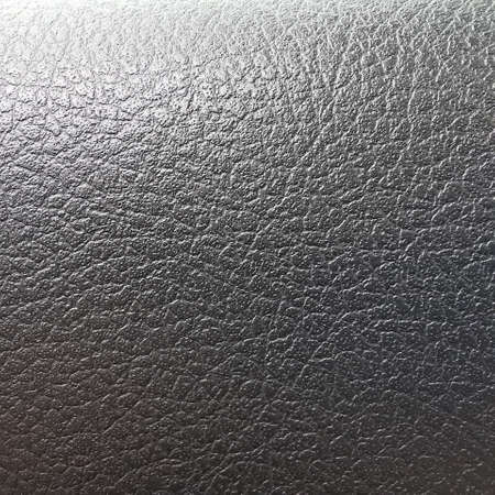 Black plastic texture of the dashboard surface plastic car interior, dashboard.