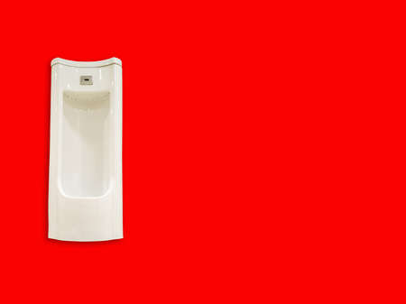 Isolated. White urinal. Floor standing. With sensor. In department stores. Red background. It's a...