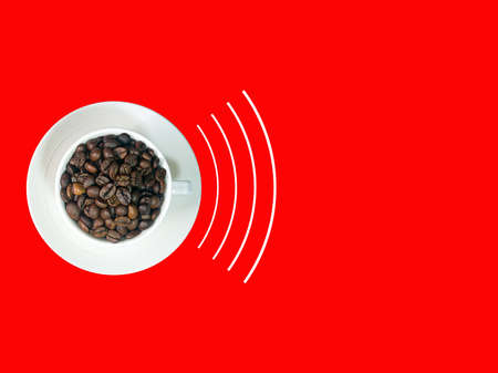 A mug with coffee beans and a saucer. White signal waves, red background.の写真素材
