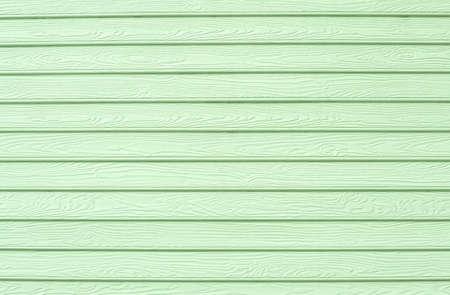 Wooden wall or artificial wood, light yellow.