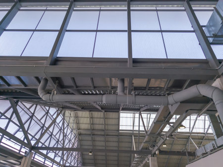 Low angle view of roof with gutters inside the building.