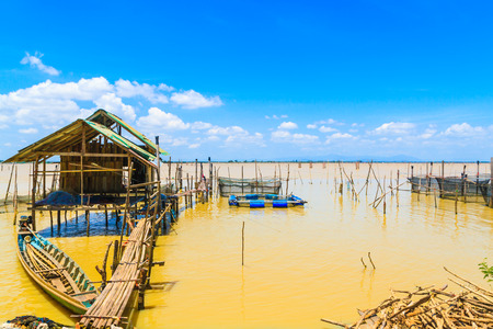 Southern Thai folk fishing With beautiful bright sky in fresh sea.の写真素材