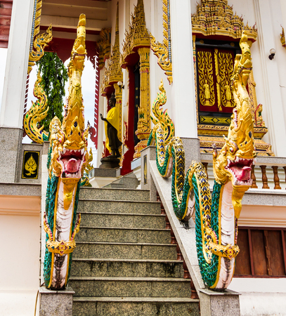 The beautiful golden church and  the blue sky in Thailand.の写真素材