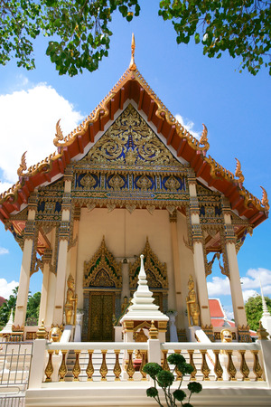 The golden church  is in old temple in daylight with clouds.の写真素材