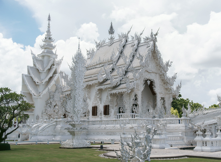 The beautiful temple of Thailand in the bright sky and cloudsの写真素材