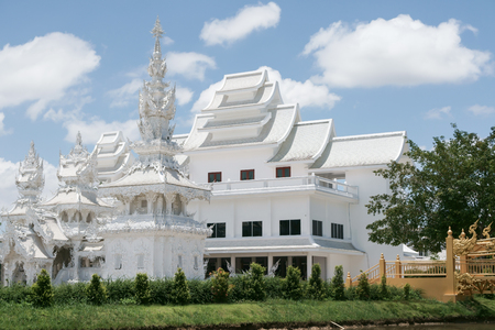 The beautiful temple of Thailand in the bright sky and cloudsの写真素材