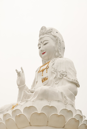 The white Buddha statue of Guan Yin is beautiful and worshiped.のeditorial素材
