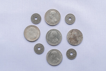 Thai currency over a hundred years ago With archaeological value and currency history.